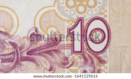 Currency (paper money) detail. Bright design element of money bill. Paper texture.