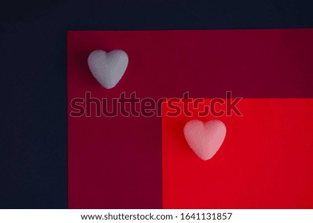 Abstract Geometric red and blue paper Background with white heart. Color block concept. Valentine or wedding concept. Multyexposure.
