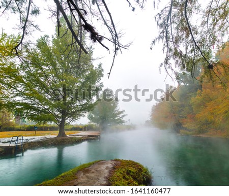 Thermal lagoon under deep sky , Blurred photo of morning fog over a lake in cold autumn weather in half moon san luis potosi