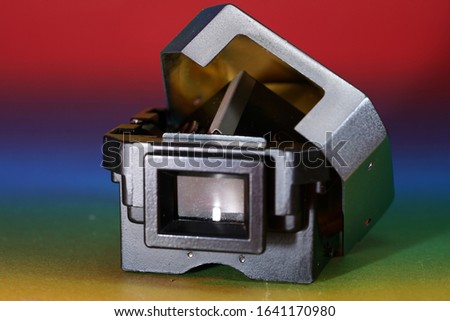 Photo glass and prisms of a disassembled camera photographed in the studio                             