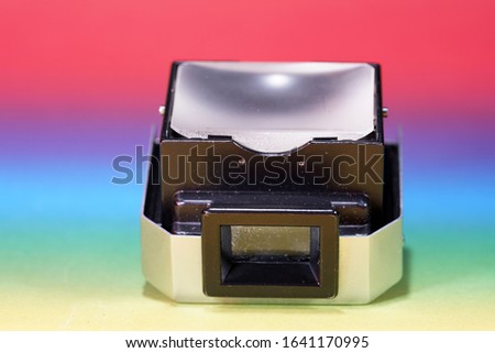 Photo glass and prisms of a disassembled camera photographed in the studio                             