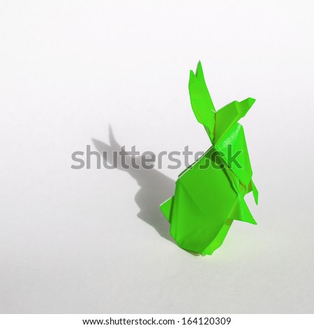 Origami Green rabbit isolated on white
