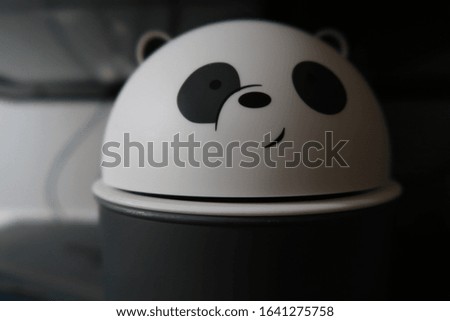 black and white smiling panda