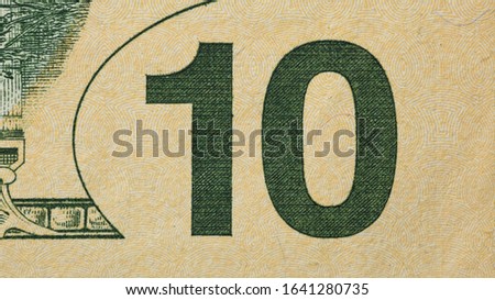 American currency (paper money) detail. Bright design element of money bill. Paper texture.
