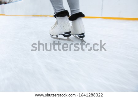ice skating on the rink in motion close up