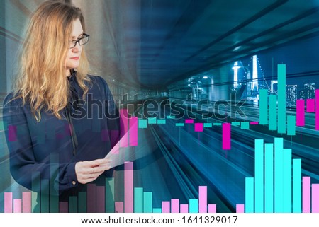 Girl on the background of high-speed train tracks and charts of changes in quotes. Sharp fluctuations in stock prices. Volatility. Changes in prices for transport companies ' shares.