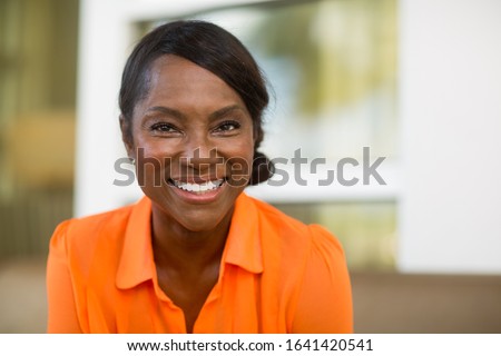 Mature African American woman smiling. Royalty-Free Stock Photo #1641420541