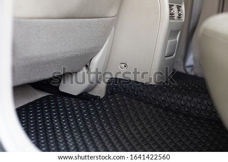 Luxurious rubber car floor mat Royalty-Free Stock Photo #1641422560
