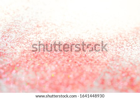 Abstract bokeh background of Pink Glitter With Sparkle Of Lights.