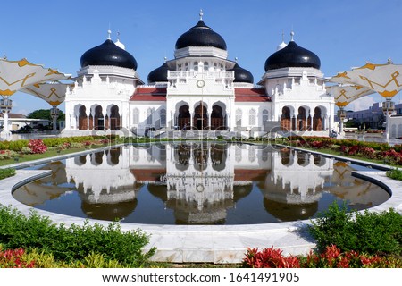 
The beauty of Baiturahman Grand Mosque as the main landmark of Banda Aceh City. Royalty-Free Stock Photo #1641491905