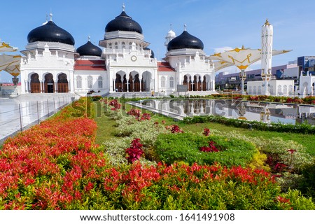 
The beauty of Baiturahman Grand Mosque as the main landmark of Banda Aceh City. Royalty-Free Stock Photo #1641491908