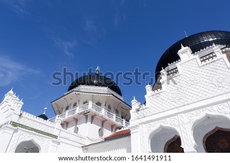 
The beauty of Baiturahman Grand Mosque as the main landmark of Banda Aceh City. Royalty-Free Stock Photo #1641491911