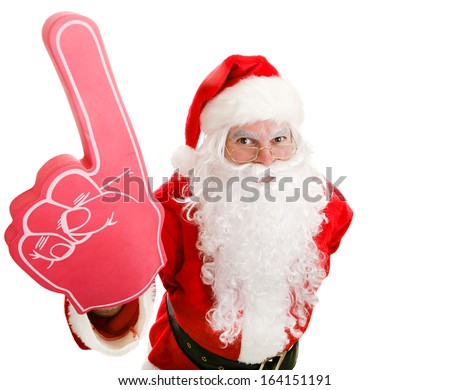 Santa Claus holding up a number one foam finger.  Isolated on white.  