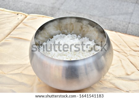 Monk's alms bowl : Put it on the table to offer food to monks at the funeral according to Thai tradition Royalty-Free Stock Photo #1641541183