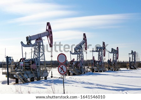 oil rocking chair in winter. Oil production in the North