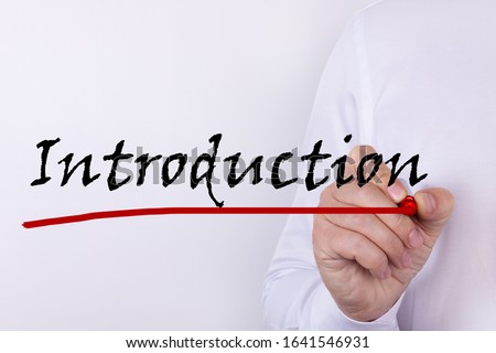 Hand writing Introduction with red marker. Business, technology, internet concept. Royalty-Free Stock Photo #1641546931