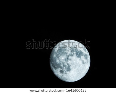 Full moon on a dark background.