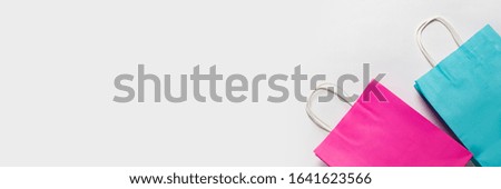 Shopping bags on a white background. Concept shopping, discount, sale. Banner. Flat lay, top view
