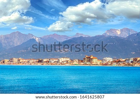 Viareggio seafront, beach and sea in winter and Apuan Alps mountains, Versilia, Lucca Tuscany, Italy Europe. Royalty-Free Stock Photo #1641625807