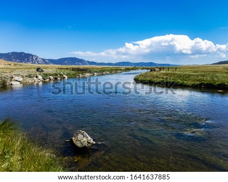 A high plains trout stream in Colorado. Royalty-Free Stock Photo #1641637885