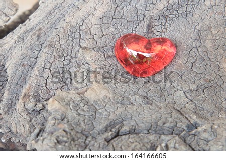 red heart on wood 