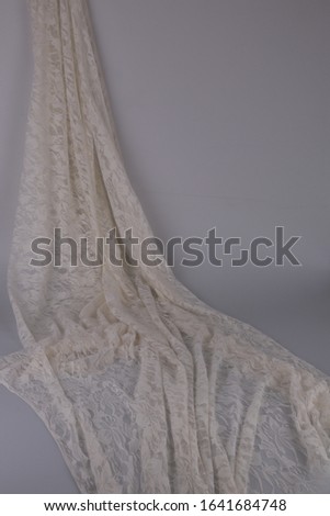 Delicate beige lace on the table