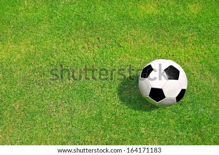 Soccer ball on football playground 