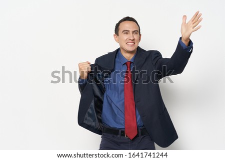 Business man gesturing with hands and a classic suit