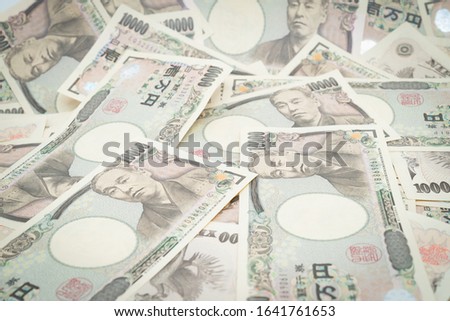 Many 10000 yen bill photos. jpy.
