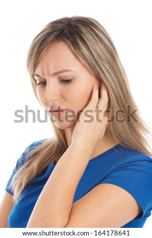Portrait of a young worrying woman touching her face. isolated on white. 