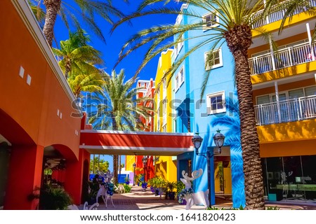 Specific coloured buildings at street of Willemstad, Curacao. Christmas decorations at caribbean island. Royalty-Free Stock Photo #1641820423