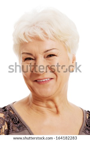Portrait of an old, smiling woman.  Isolated on white. 