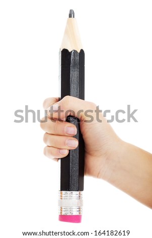 Woman's hand is holding big pencil. Isolated on white. 