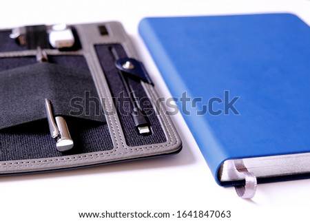 Blurred focus, artistic blur. Soft plan. Organizer for business. Selective focus. Handle, battery charger for flash cards
