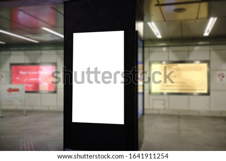 blank advertising billboard at airport,Mock up Poster media template Ads display in Subway station escalator.