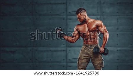 Strong Muscular Army Men Exercise With Dumbbells, Lifting Weights Royalty-Free Stock Photo #1641925780