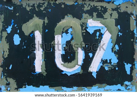 House address plate number (107)
