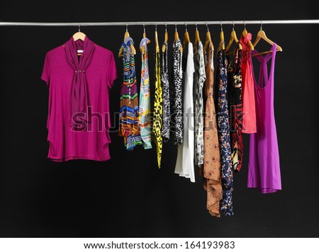 Set of Female Variety of sundress clothes hanging Ã¢Â?Â?black background