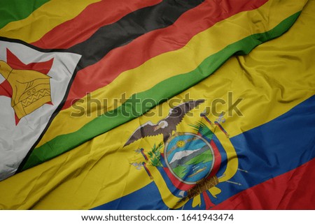 waving colorful flag of ecuador and national flag of zimbabwe. macro