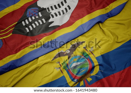 waving colorful flag of ecuador and national flag of swaziland. macro