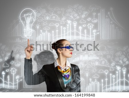Image of businesswoman in goggles with business sketch at background. Idea concept