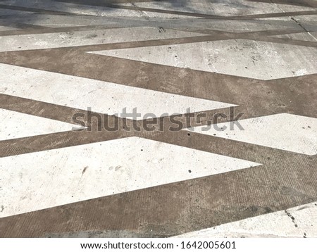 Closeup modern zebra crossing design on concrete road