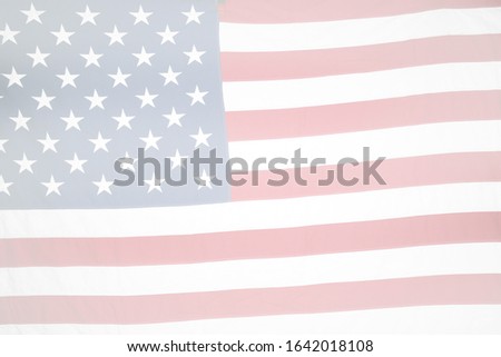 Faded American Flag. US Flag. Translucent American Red White and Blue Flag with room for text overlay. Backgrounds and Textures. God Bless America. 
