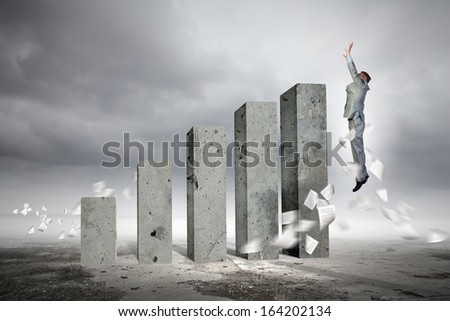 Image of businessman jumping above bars. Success in business