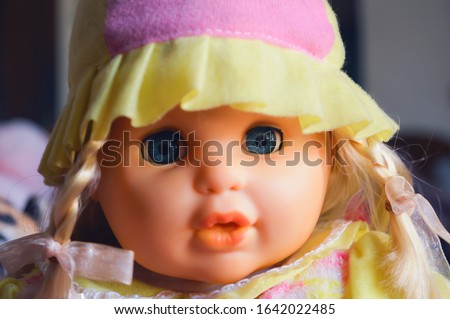  A doll is a toy or puppet,often used as a toy for children.