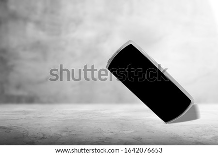 Mobile cell phone with blank screen on desk