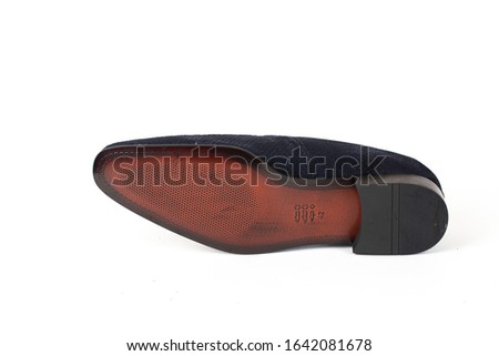 Men's classic navy blue suede shoes isolated on white background
