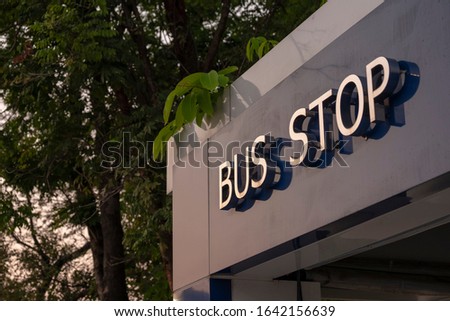 Public transport bus stop station text symbol 