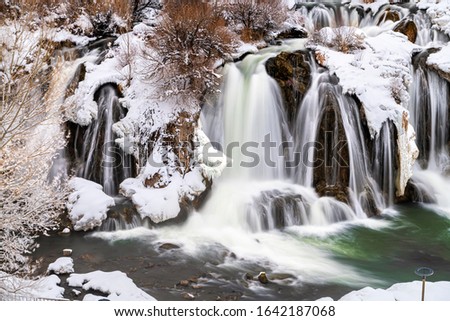 Muradiye Waterfall in Van is still flowing strong in winter. Turkey