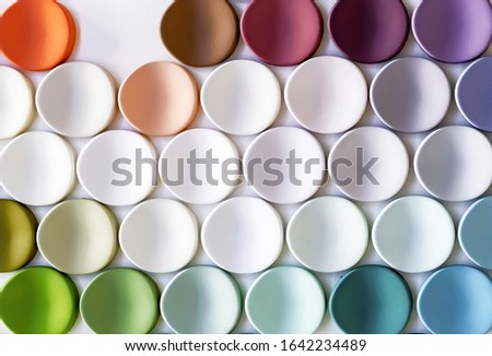 Multi-colored circles with 3D effect. Circles with a palette for the selection of interior paints.